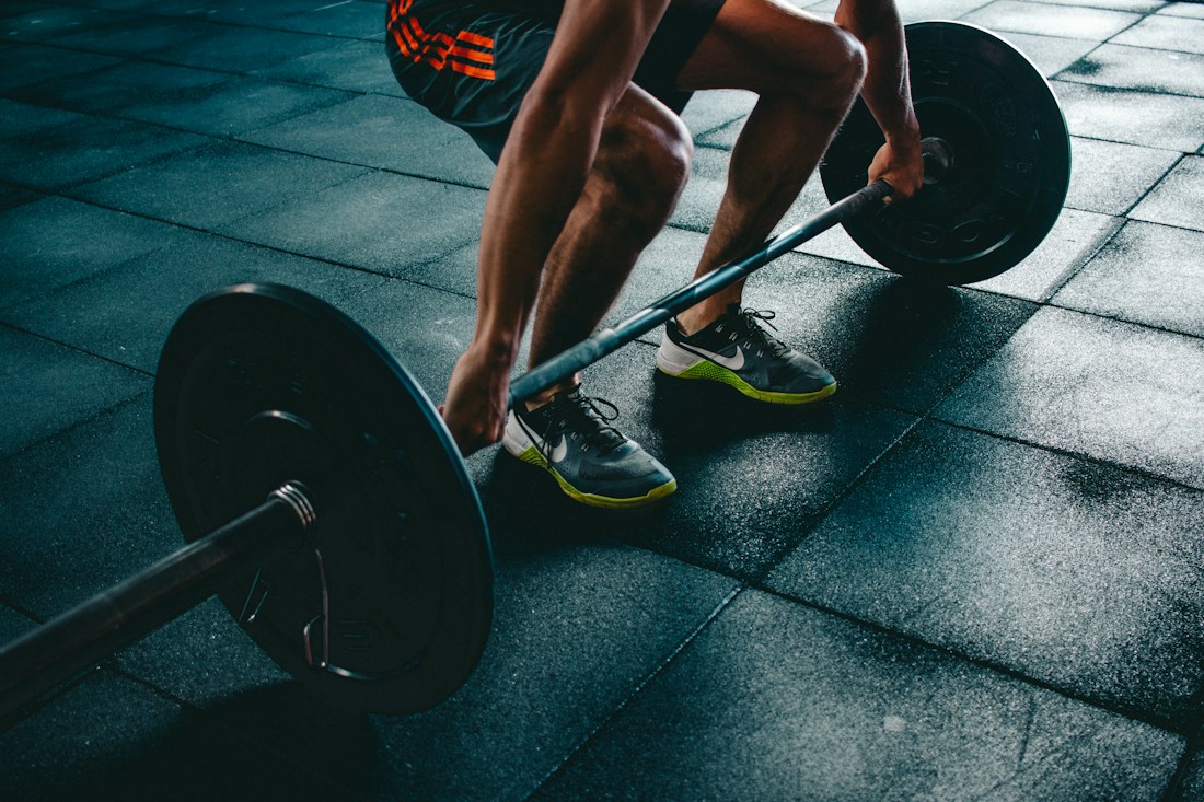 Athlete training in a real gym
